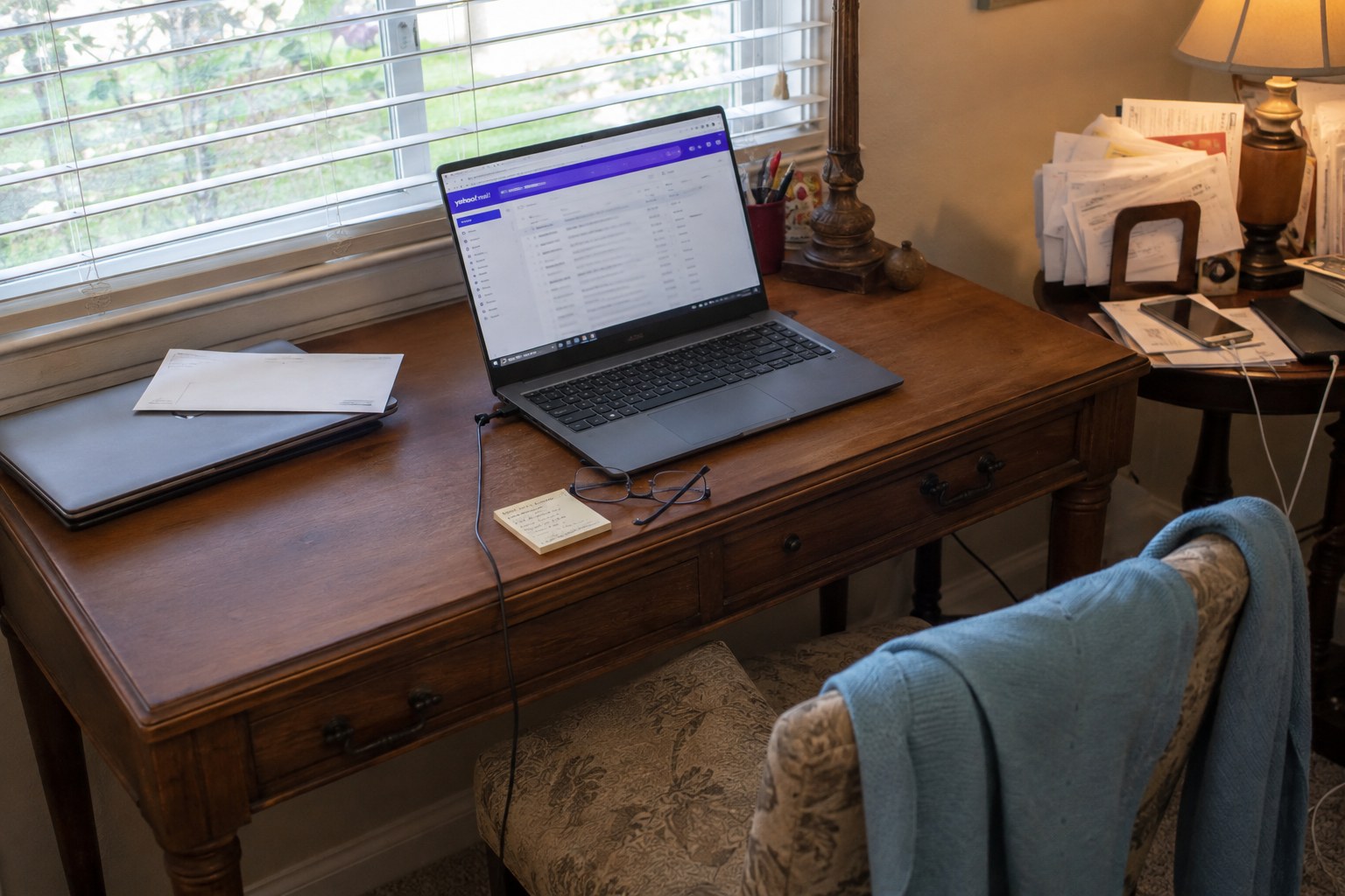 a laptop email setup on an everyday home writing desk