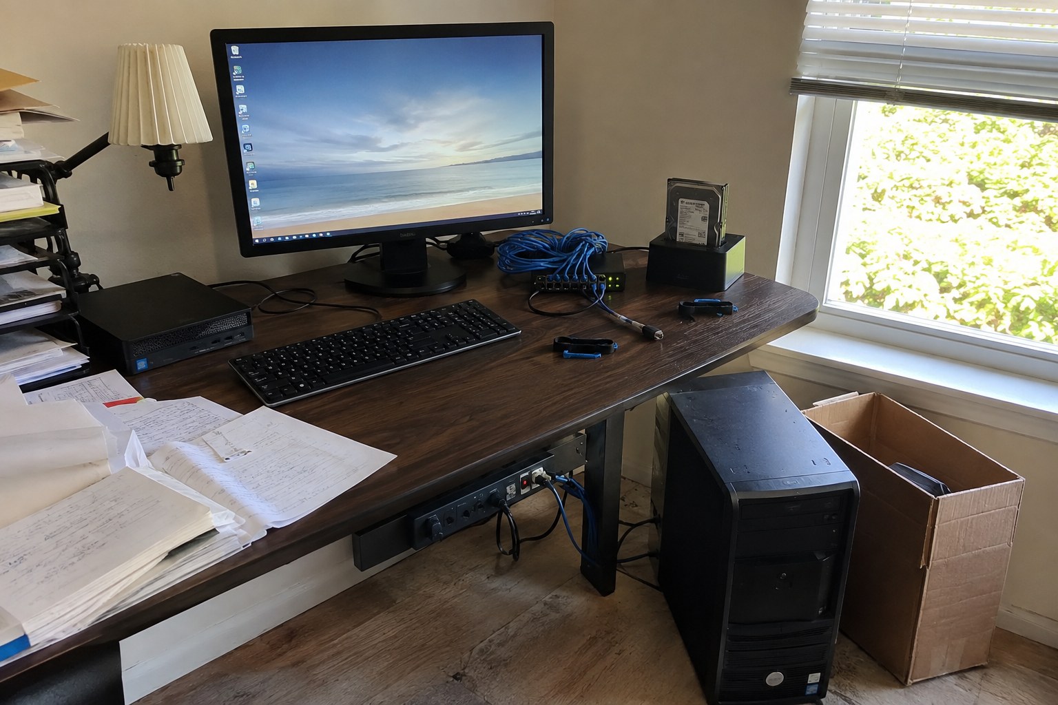 a compact replacement workstation with drive access, Ethernet connections, and surge protection